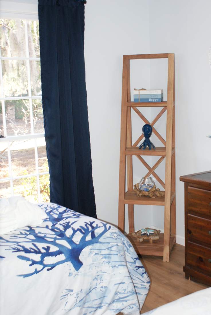 Bedroom with navy accents and nautical decor
